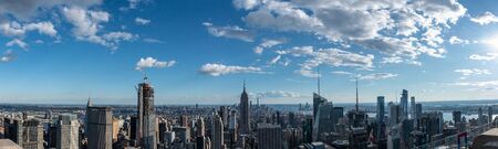 NYCs lower Manhattan with the Empire State Building from a high up point in Midtownの写真素材