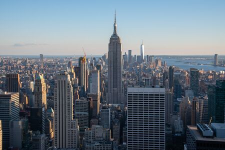 NYCs lower Manhattan with the Empire State Building from a high up point in Midtownの写真素材