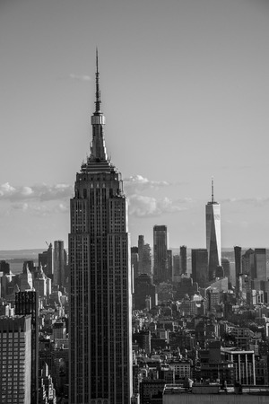 NYCs lower Manhattan with the Empire State Building from a high up point in Midtownのeditorial素材