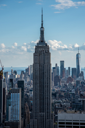 NYCs lower Manhattan with the Empire State Building from a high up point in Midtownのeditorial素材