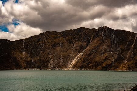 Panorama of the Quilotoa volcano with its water-filled caldera (Ecuador)の写真素材