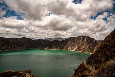 Panorama of the Quilotoa volcano with its water-filled caldera (Ecuador)の写真素材