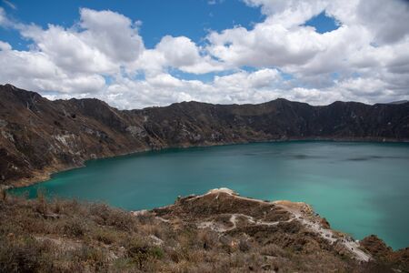 Panorama of the Quilotoa volcano with its water-filled caldera (Ecuador)の写真素材