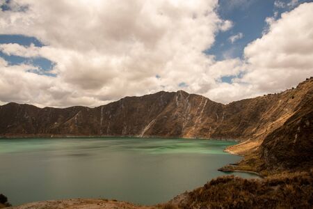 Panorama of the Quilotoa volcano with its water-filled caldera (Ecuador)の写真素材
