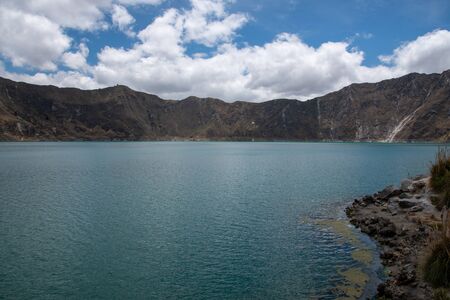 Panorama of the Quilotoa volcano with its water-filled caldera (Ecuador)の写真素材