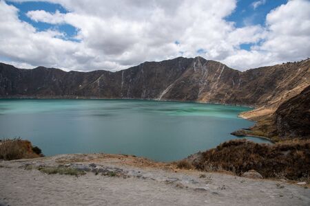 Panorama of the Quilotoa volcano with its water-filled caldera (Ecuador)の写真素材