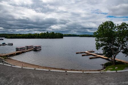 Wooden docks and boats at Port Loring in Ontario Canadaの写真素材
