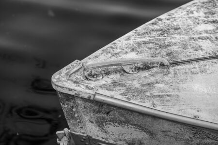 Detail of the front handle of an abandon boat in a lake in Ontarioの写真素材
