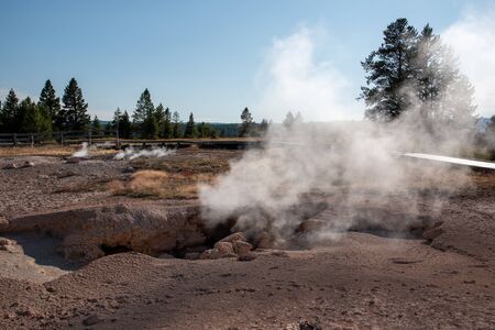 Spouter geyser before an eruption in the upper geyser basin in Yellowstoneの写真素材