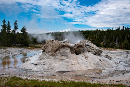 Grotto geyser before an eruption in the upper geyser basin in Yellowstoneの写真素材