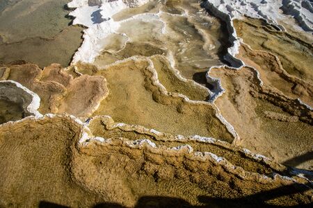 Mineral deposits coming from hot springs at the Mammoth area in Yellowstoneの写真素材