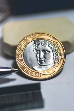 Real, Brazilian Currency. Money, Coin, 1 Real. A one Real coin in close-up.