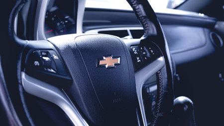 Interior of a 2013 Chevrolet Camaro rs cabriolet. Highlighted on the company logo on the steering wheel. BrasÃ­lia, Federal District - Brazil. 03, January, 2021.のeditorial素材