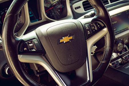 Interior of a 2013 Chevrolet Camaro rs cabriolet. Highlighted on the company logo on the steering wheel. BrasÃ­lia, Federal District - Brazil. 03, January, 2021.のeditorial素材