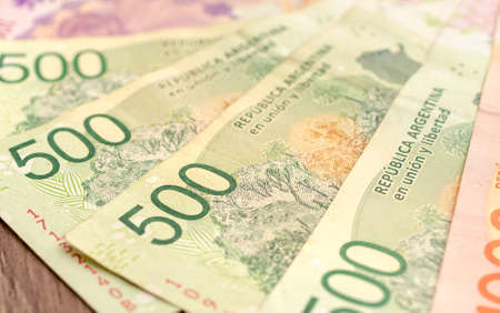 Pesos banknotes in money close-up of argetina's currency, the Argentine peso. Photo for...