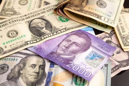 Dollars and Ukrainian hryvnias. Money backgroundの写真素材