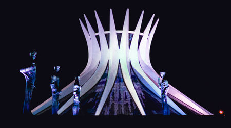 3D rendering of a futuristic building in the middle of the nightの写真素材