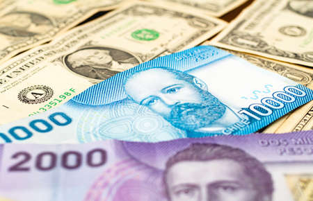 Close up view of American dollar and Turkish lira banknotes.