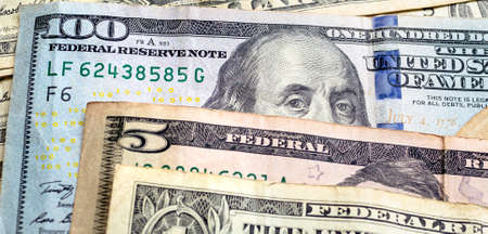 Close-up view of one hundred dollar bills. Finance concept.