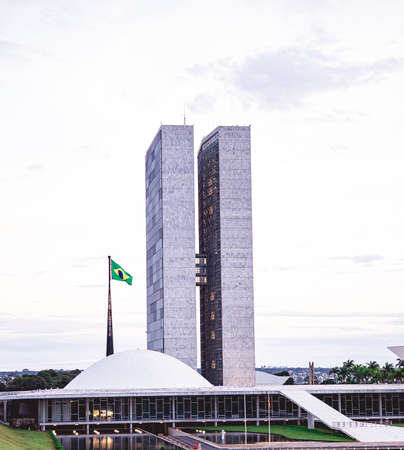 The National Congress of Brazil. Building designed by Oscar Niemeyer. Photography taken in the late afternoon. Brasilia, Federal District - Brazil. December, 04, 2021.のeditorial素材