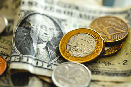 American dollars and coins close-up. Business and finance concept.