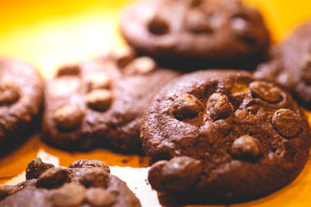 Chocolate chip cookies on a wooden table. Close-up. Selective focus.の写真素材