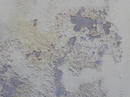 Close up of Old painted wall damage surfaceの写真素材