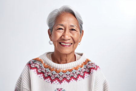 Portrait of happy senior asian woman smiling and looking at cameraの素材