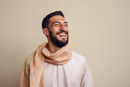 Portrait of a happy arabic man with a scarf.の素材