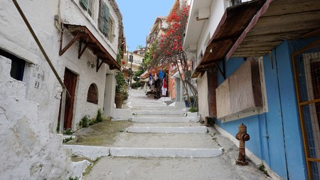 A colorful Street in Parga, Greece. A combination between mountain and sea, cottages in old and new Mediterranean style. One of the most mysterious and magical places in Greece. Photos of the year 01.05.2016 was filmed.のeditorial素材