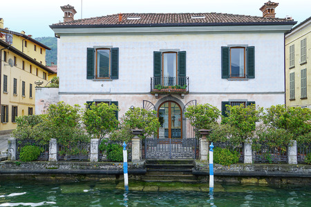 Villa in town Iseo on Lake Iseo, Italy. The Villa is on the shore of the Lake Iseo.のeditorial素材