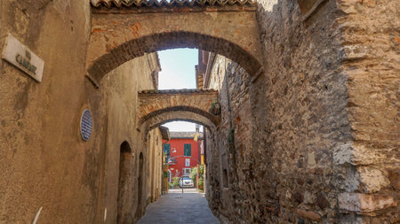 Medieval street in Sirmeone, Italy.の写真素材