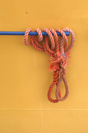 A close-up of a rope on a fishing boat