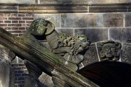 A statue of a lion on the weighing house in Deventer, the Netherlandsの写真素材