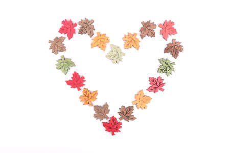 A heart made out of decorative wooden leavesの写真素材