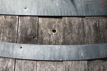 A close-up of a wooden barrel
