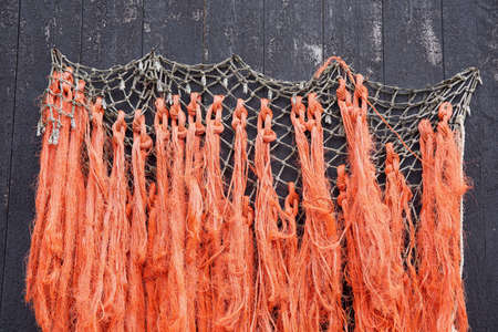 Close-up of an old fishing net used as a decoration nowの写真素材