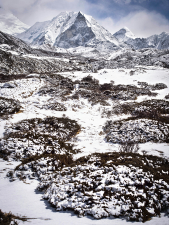 The stunning Island Peak, or Imja Tse, near the Himalayan settlement of Dingboche along the Everest Base Camp Trek in Nepalの写真素材