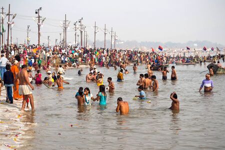 Pilgrims Bathing in the Sangam at Kumbh Mela 2013 in Allahabad, Indiaのeditorial素材