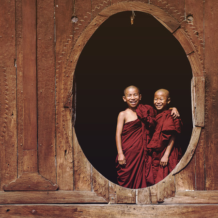 Novice Buddhist Monks Smiling at Shwe Yan Pyay Monastery in Nyaung Shwe Village, Near Inle Lake, Myanmar (Burma)のeditorial素材