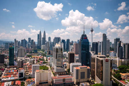 Kuala Lumpur, Malaysia - April 28, 2018: Aerial view of Kuala Lumpur cityscape including national landmark Petronas Twin Towers on a sunny day in Kuala Lumpur, Malaysia.のeditorial素材