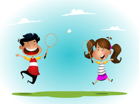 two girls playing badminton outdoorの写真素材