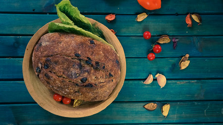vegetables with fresh organic fruits and vegetable food. healthy diet rustic farmhouse style homemade bread red Himalayan saltの写真素材