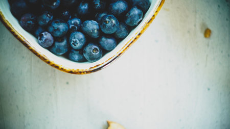 fresh organic blueberries sweet wholesome rustic on wooden table in farm close up top viewの写真素材