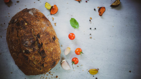 vegetables with fresh organic fruits and vegetable food. healthy diet rustic farmhouse style homemade bread red Himalayan saltの写真素材