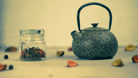 chinese teapot green healthy tea traditional tea ceremony wooden background interiorの写真素材