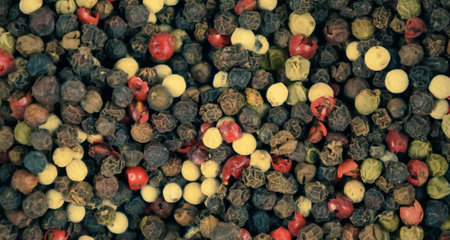 black peppercorns colorful pepper seeds close-up macro texture condiments and spicesの写真素材