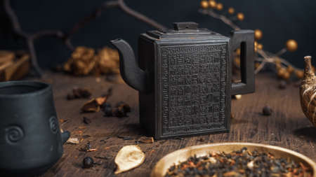 chinese teapot green healthy tea traditional tea ceremony wooden background interiorの写真素材