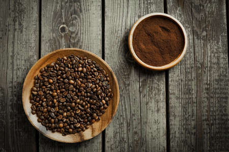 Black roasted coffee beans. Cezva cup coffee glass rustic style Turkish ground coffeeの写真素材