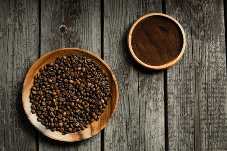 Black roasted coffee beans. Cezva cup coffee glass rustic style Turkish ground coffeeの写真素材
